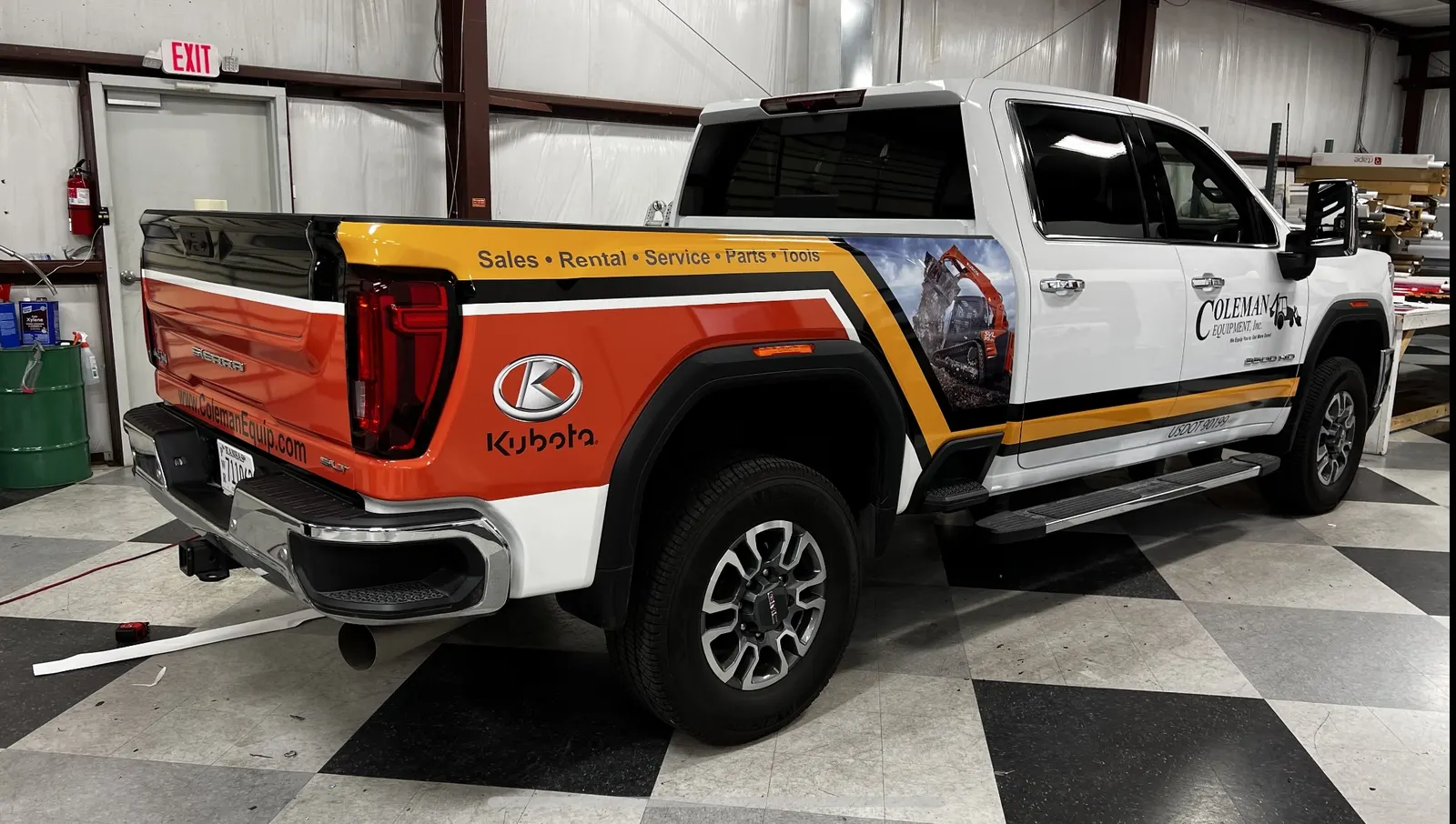 Coleman Equipment — Kubota colors — GMC Sierra