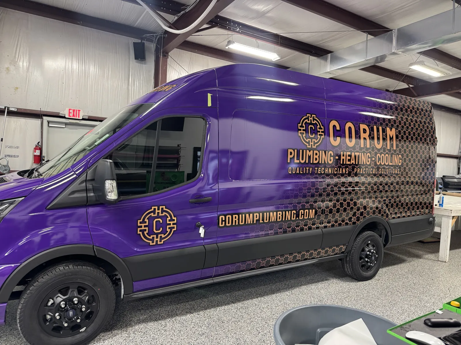 Corum fleet van, driver side — Ford Transit